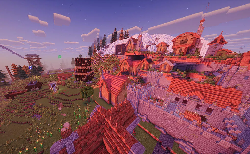 A red-roofed town on a hill next to a snowy mountain