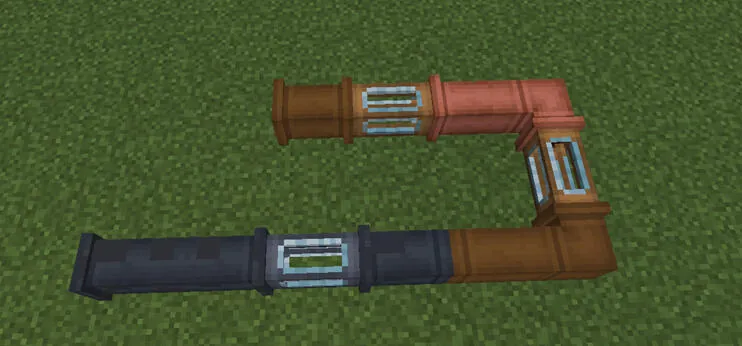 Copper pipes bending across the ground